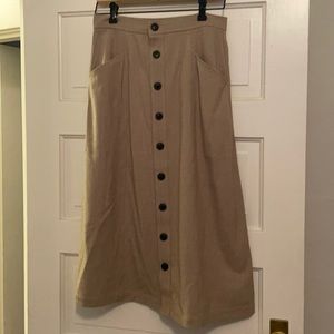 Shin length wool elastic button skirt